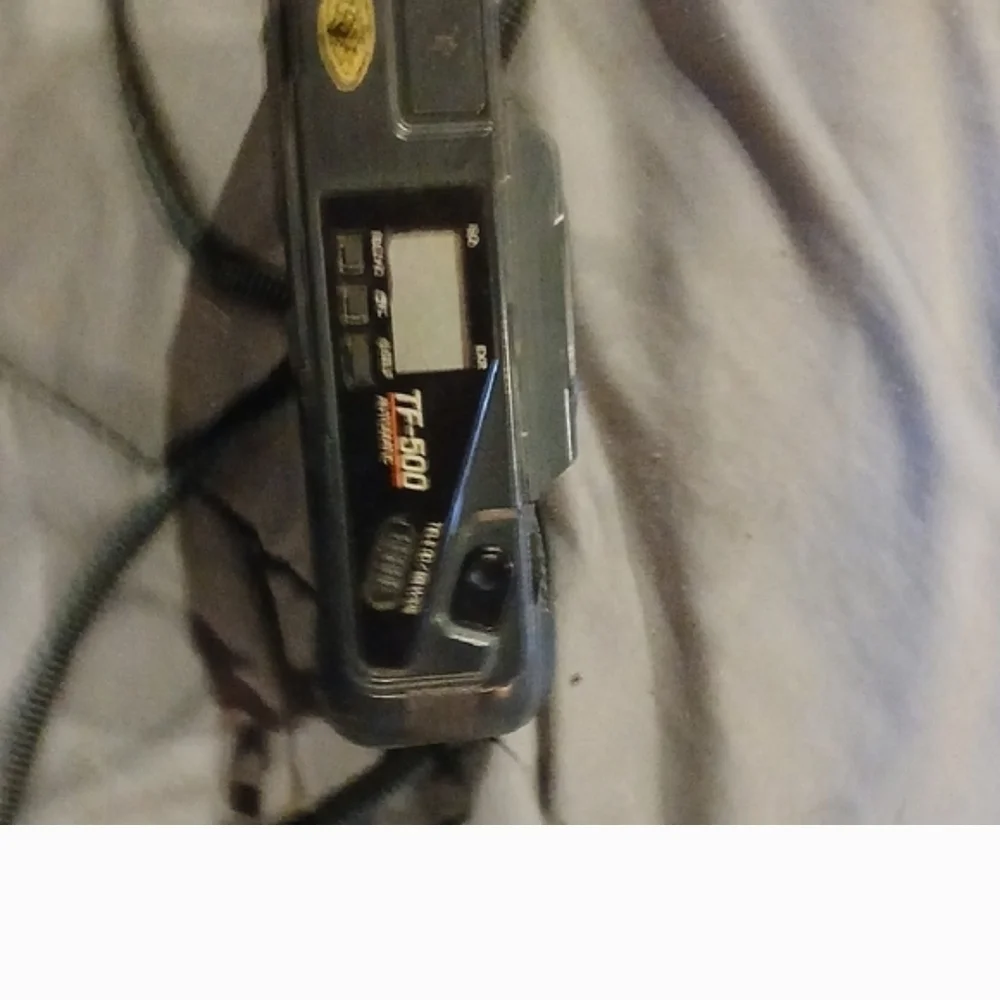 Nikon Black Film Camera with Red Accents